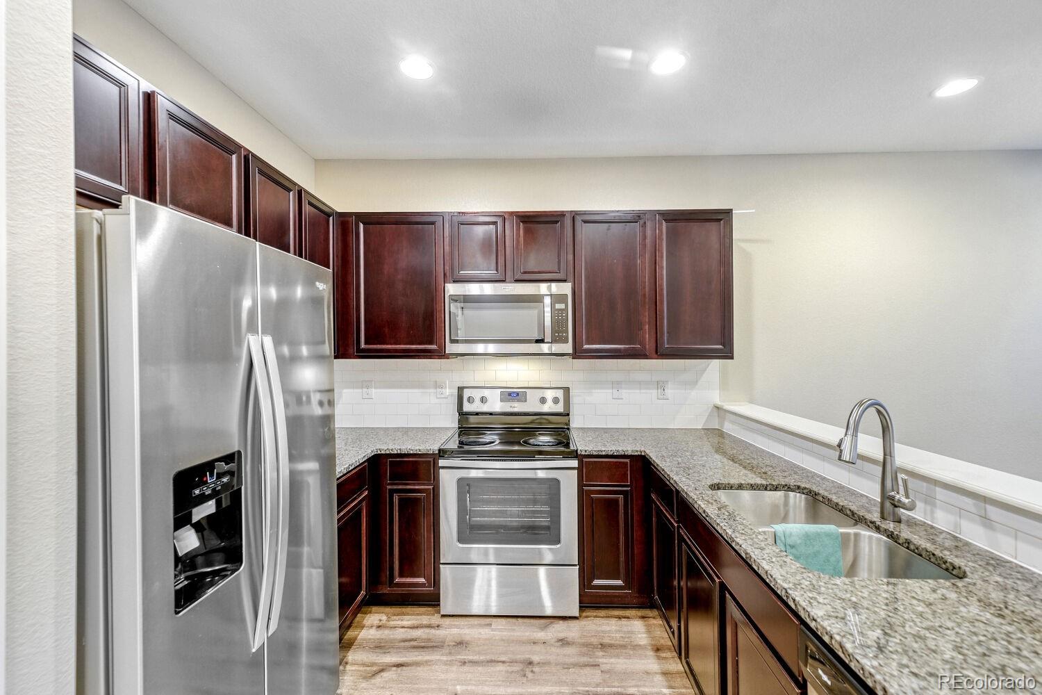 MLS Image #2 for 16061 e warner place,denver, Colorado