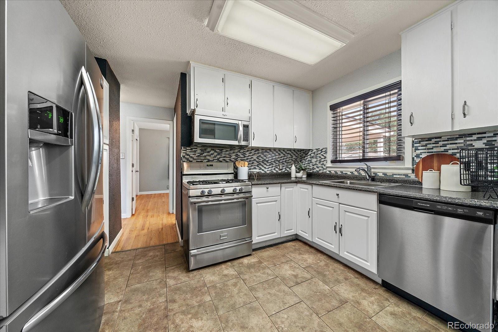 MLS Image #6 for 750  kenton street,aurora, Colorado