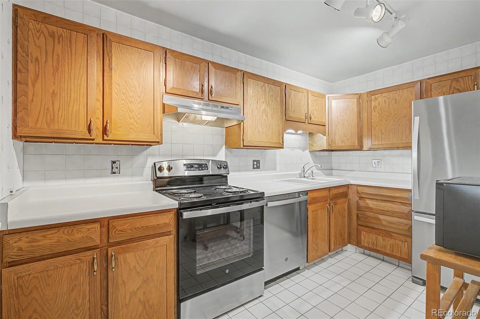 MLS Image #0 for 13635 e bates avenue,aurora, Colorado
