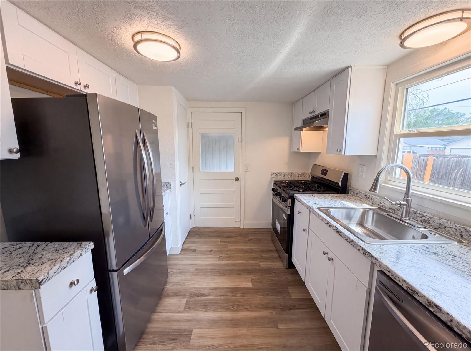 MLS Image #1 for 1298 s perry street,denver, Colorado