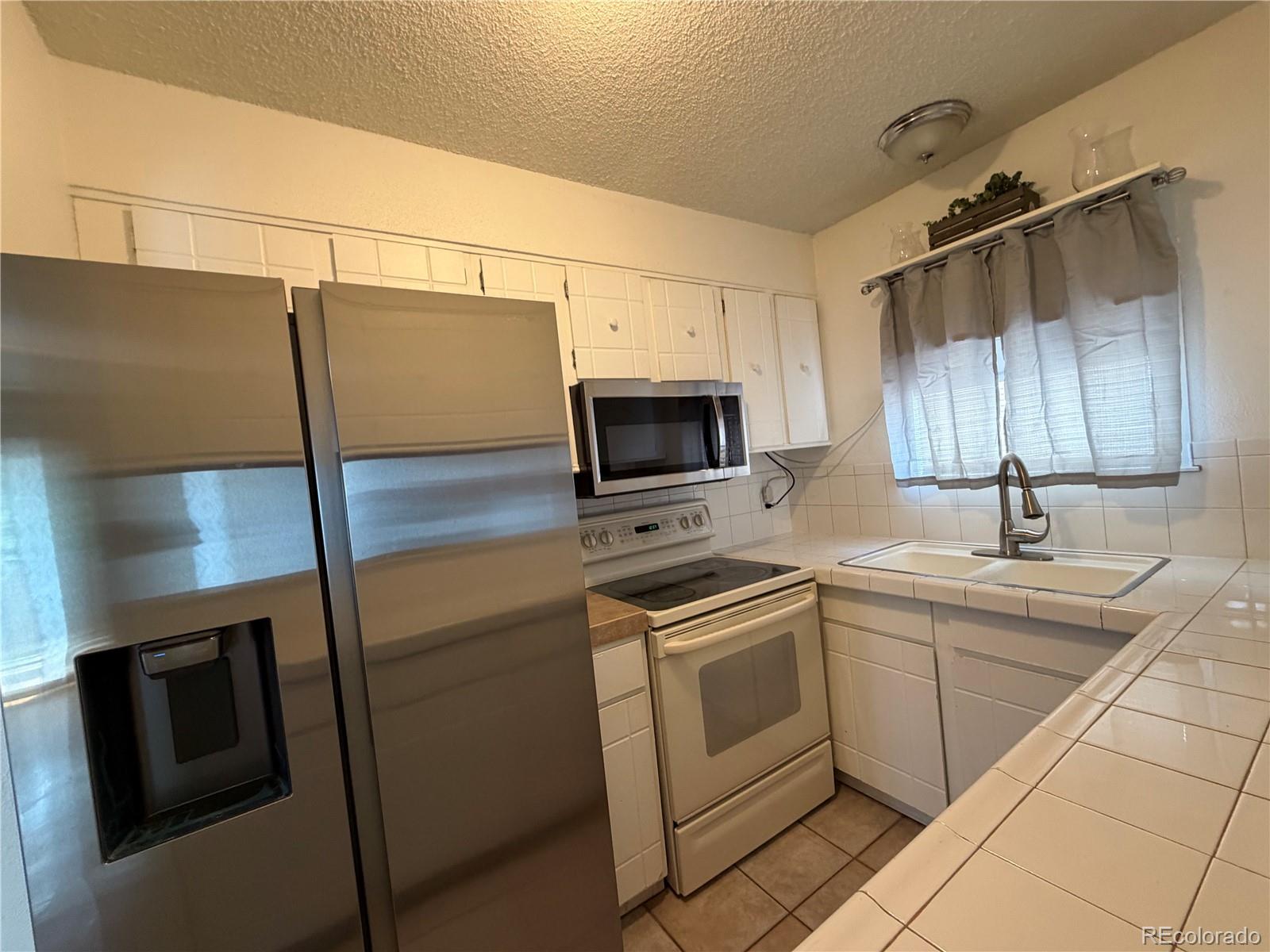 MLS Image #6 for 7309 w hampden avenue,lakewood, Colorado