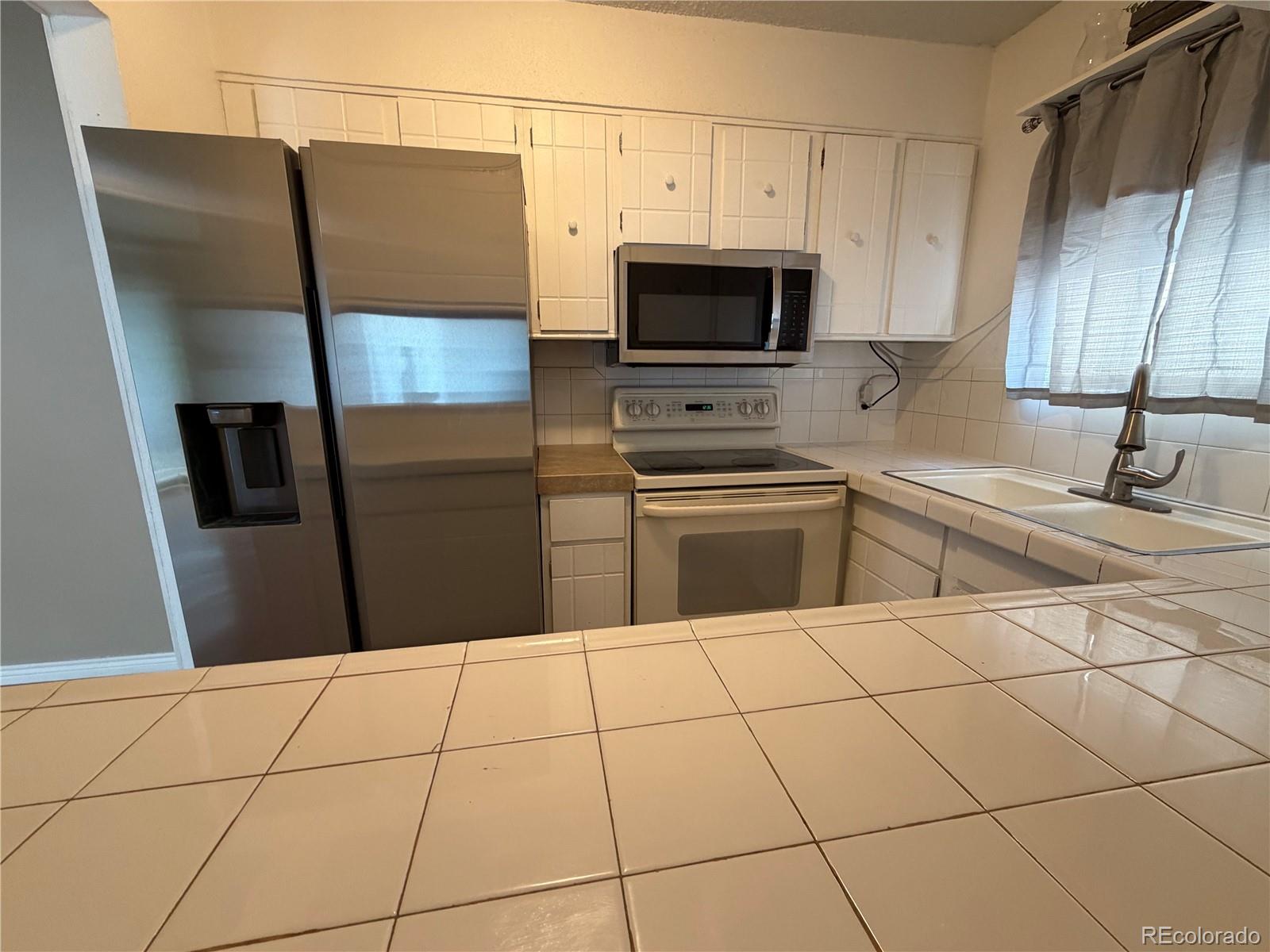 MLS Image #7 for 7309 w hampden avenue,lakewood, Colorado