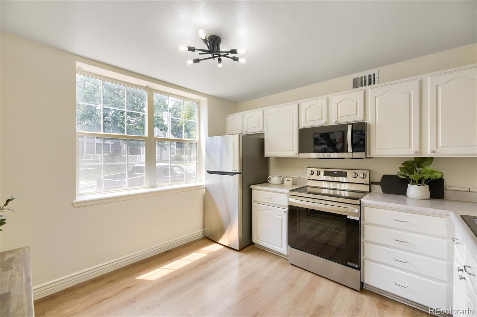 MLS Image #6 for 5755 w atlantic place,denver, Colorado