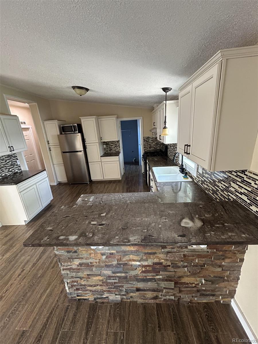 MLS Image #1 for 242  faraday street,monte vista, Colorado