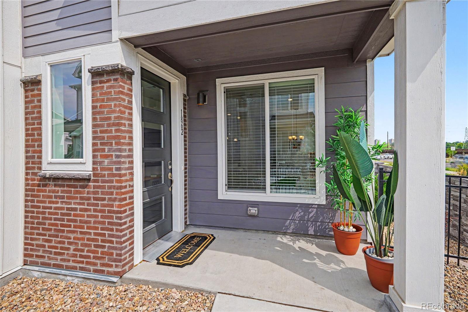 MLS Image #1 for 1862 s poplar court,denver, Colorado
