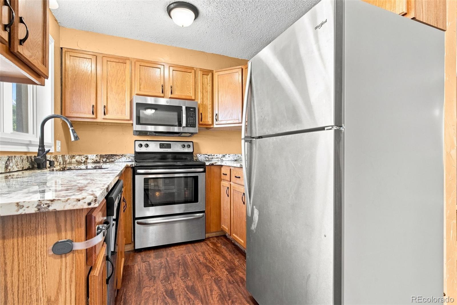 MLS Image #4 for 1525 s holly street,denver, Colorado