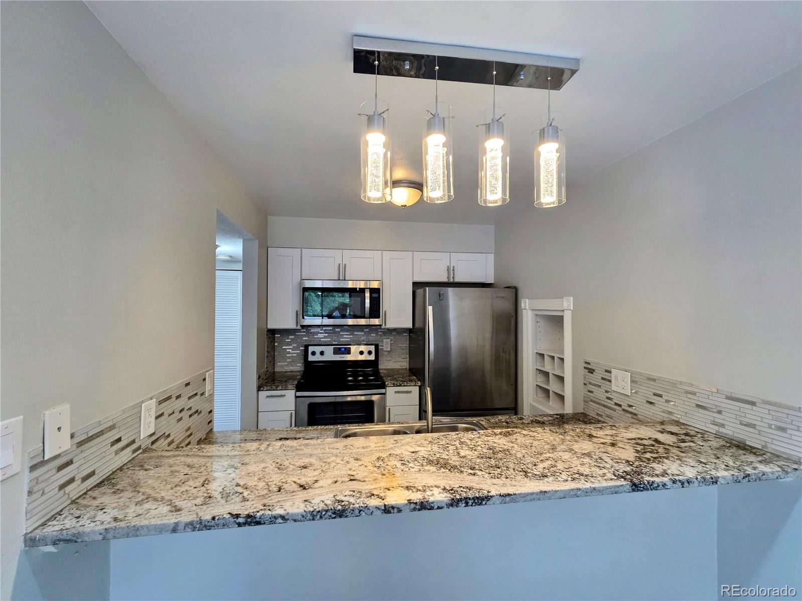 MLS Image #1 for 1772 s trenton street,denver, Colorado