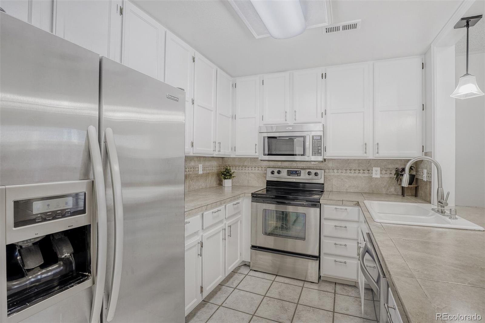 MLS Image #6 for 12404 e tennessee circle,aurora, Colorado