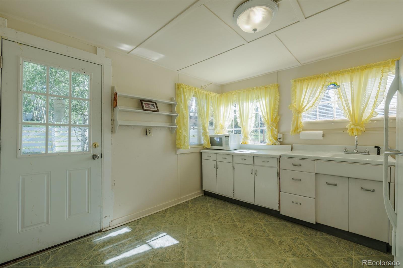 MLS Image #10 for 517  portland avenue,victor, Colorado