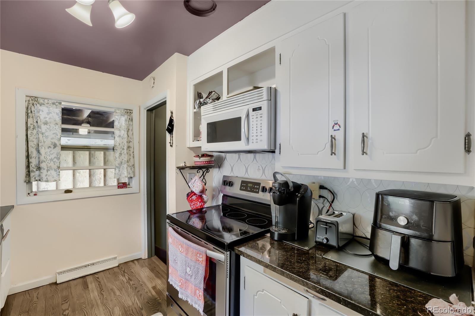 MLS Image #5 for 1643 s quitman street,denver, Colorado
