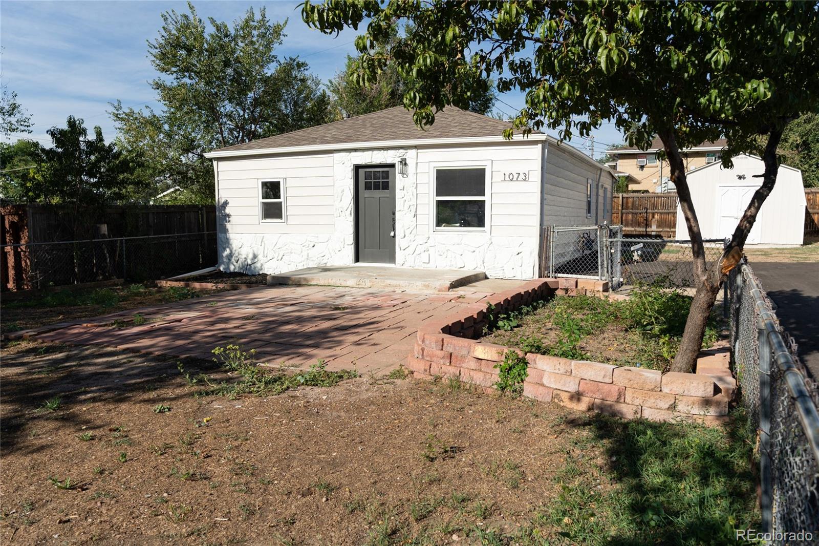 MLS Image #1 for 1073 s raleigh street,denver, Colorado