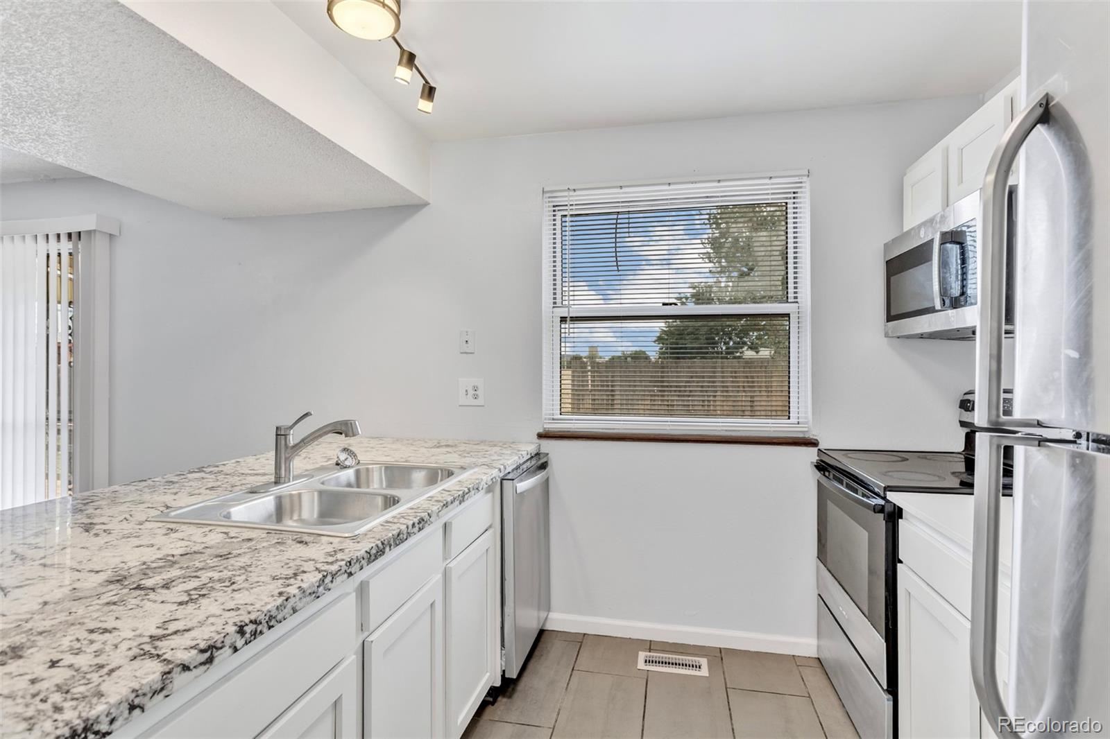 MLS Image #10 for 15084 e andrews drive,denver, Colorado