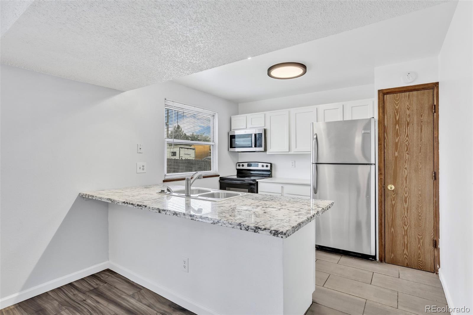 MLS Image #9 for 15084 e andrews drive,denver, Colorado