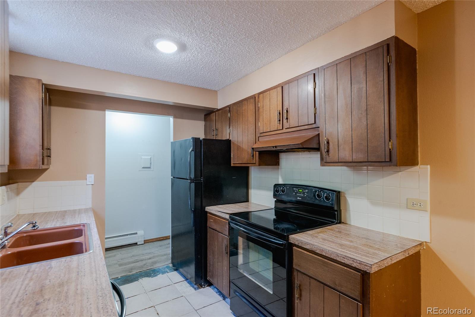 MLS Image #9 for 1525 s holly street,denver, Colorado