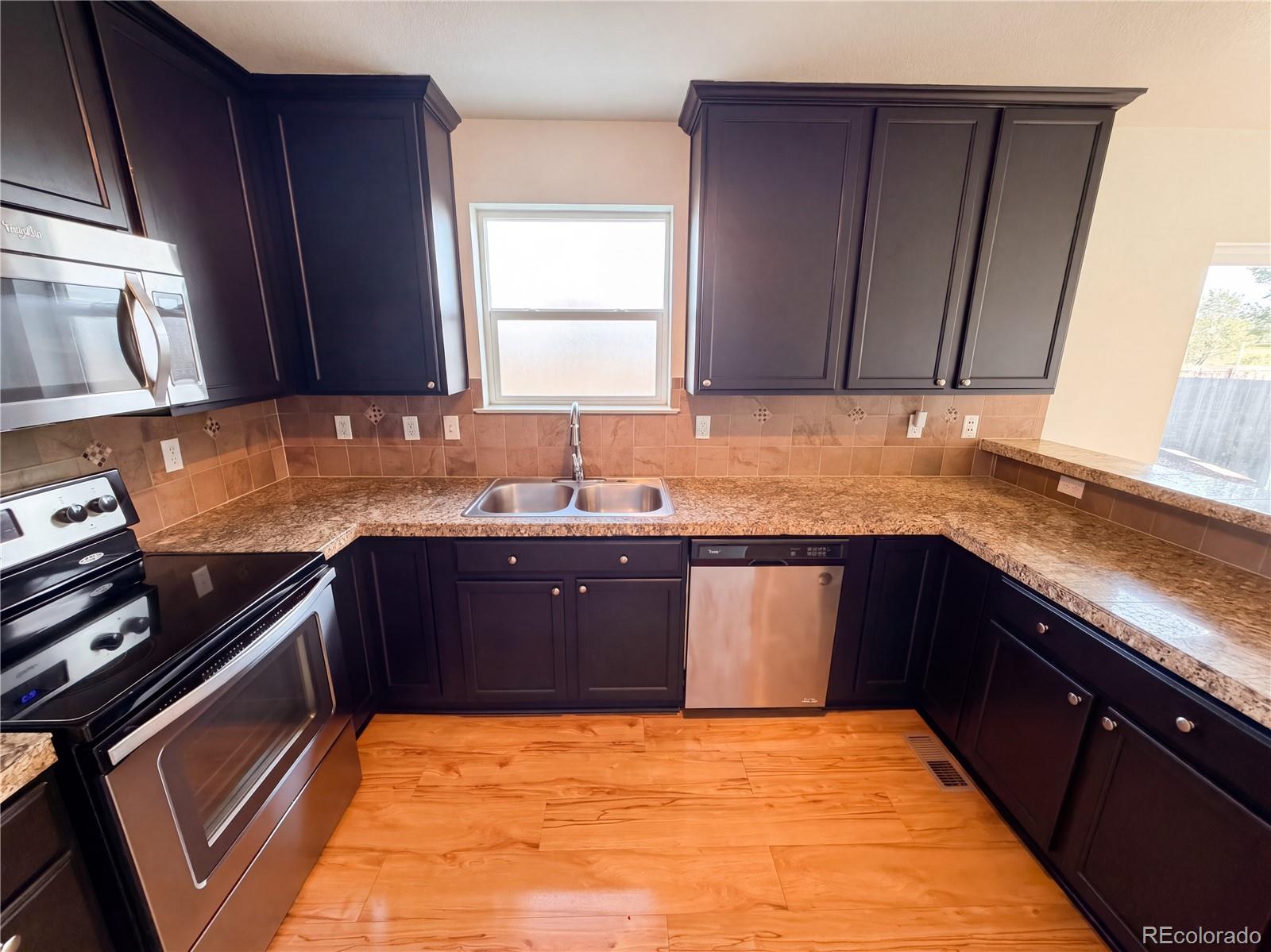 MLS Image #1 for 2084  basil street,strasburg, Colorado