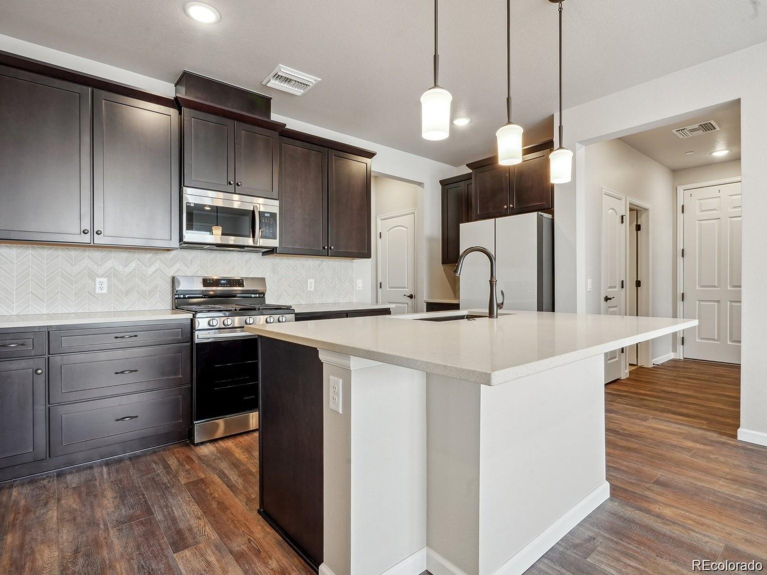 MLS Image #1 for 6153 n ceylon street 207,denver, Colorado
