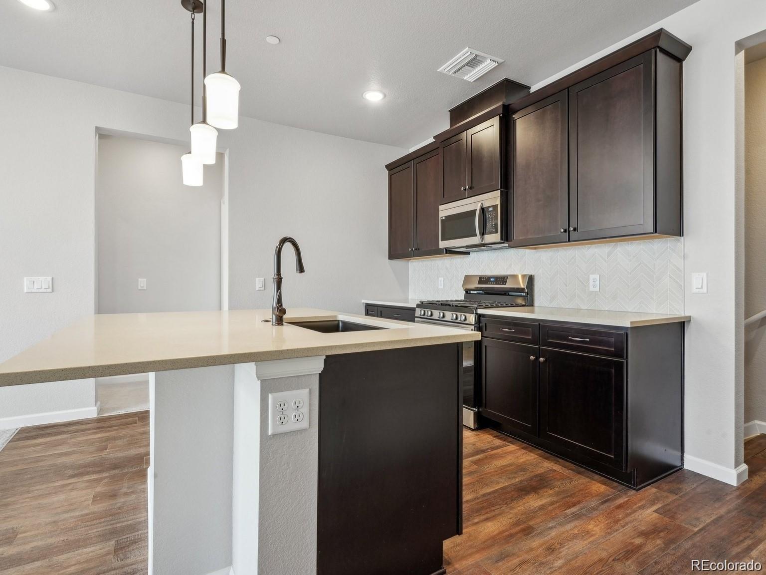 MLS Image #2 for 6153 n ceylon street 207,denver, Colorado