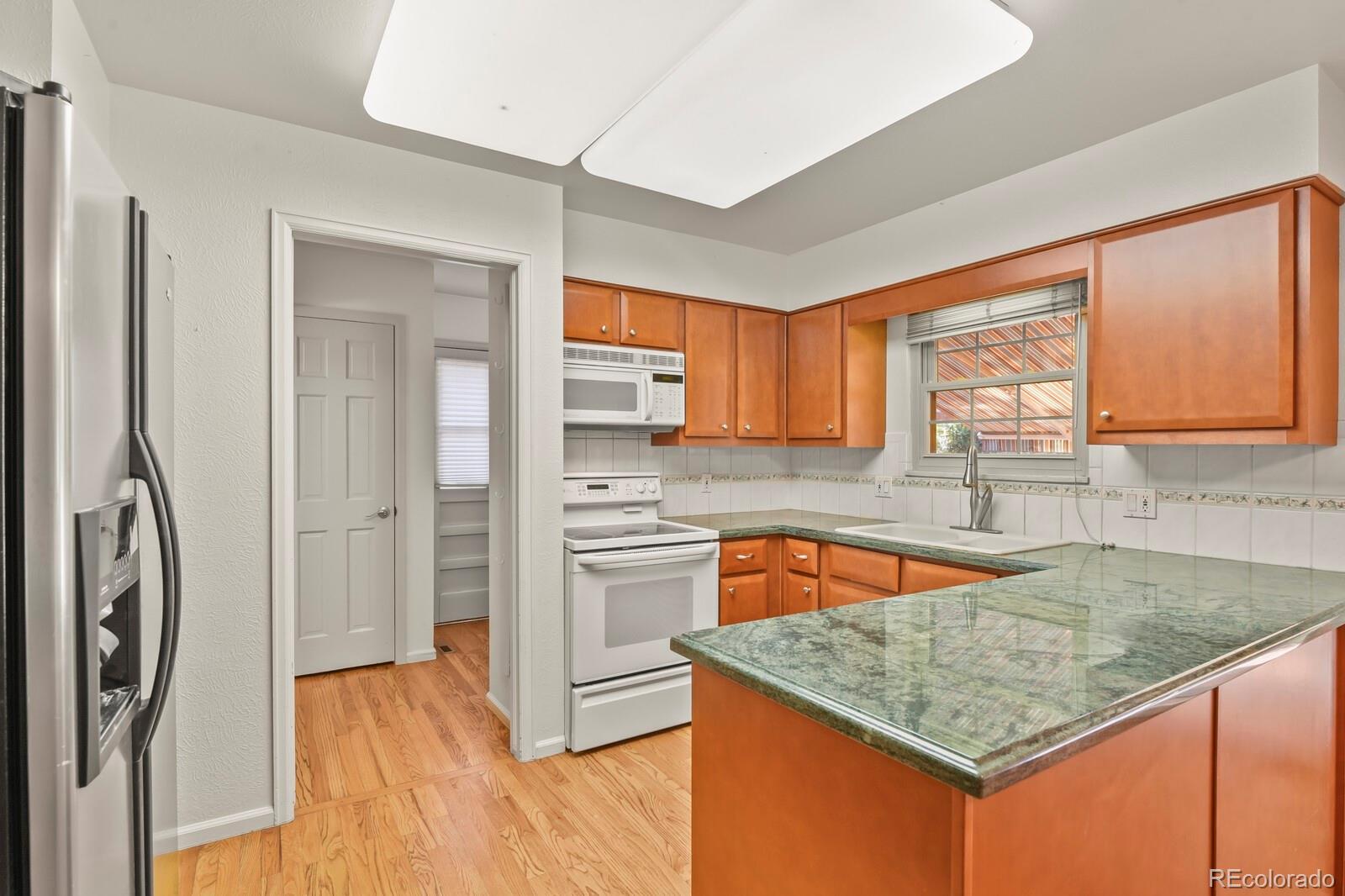MLS Image #2 for 12506 e vassar drive,aurora, Colorado