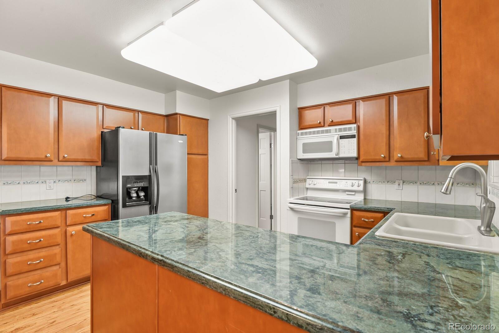 MLS Image #3 for 12506 e vassar drive,aurora, Colorado