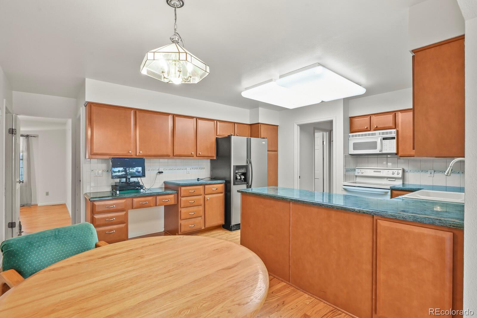 MLS Image #5 for 12506 e vassar drive,aurora, Colorado