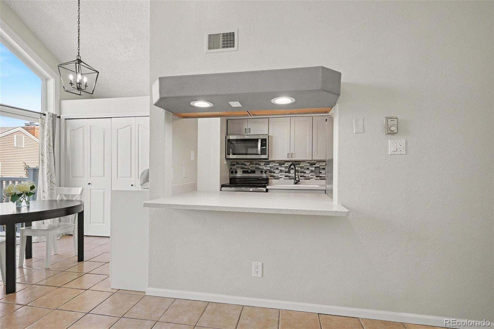 MLS Image #5 for 3343 s monaco street parkway,denver, Colorado