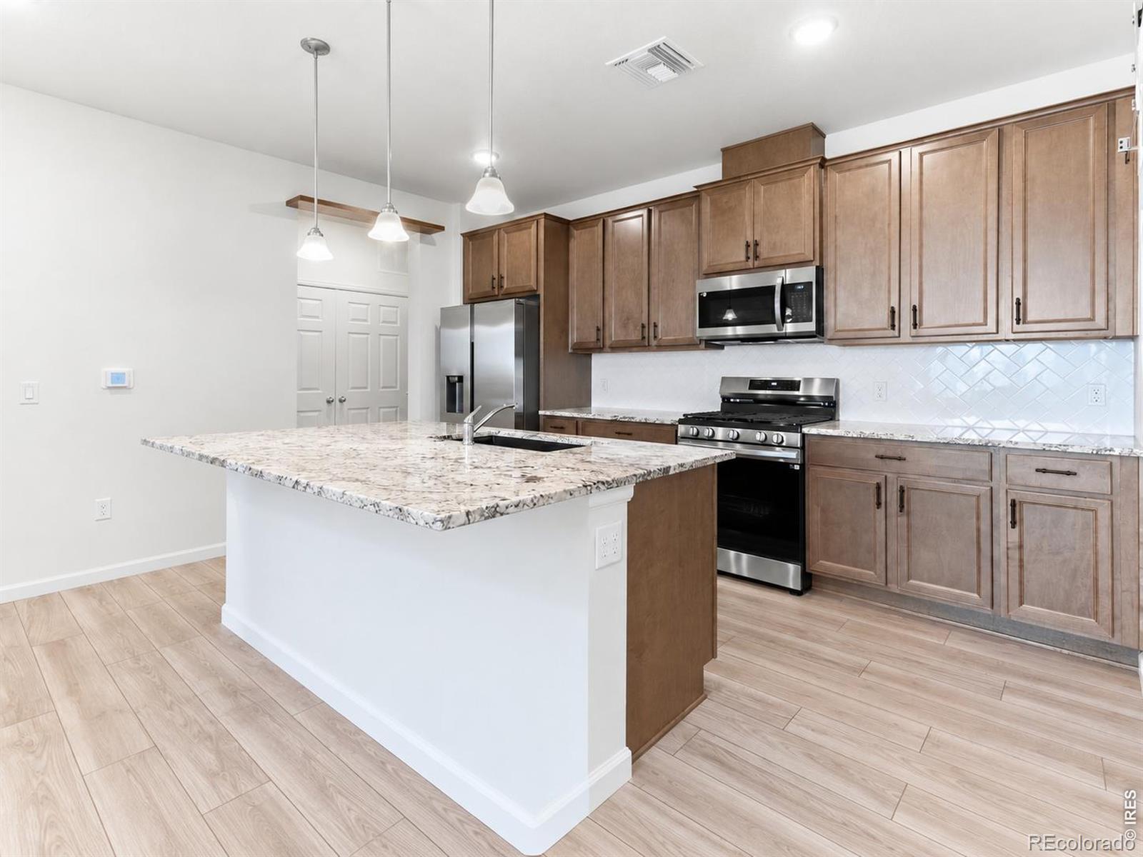 MLS Image #5 for 6153 n ceylon street,denver, Colorado