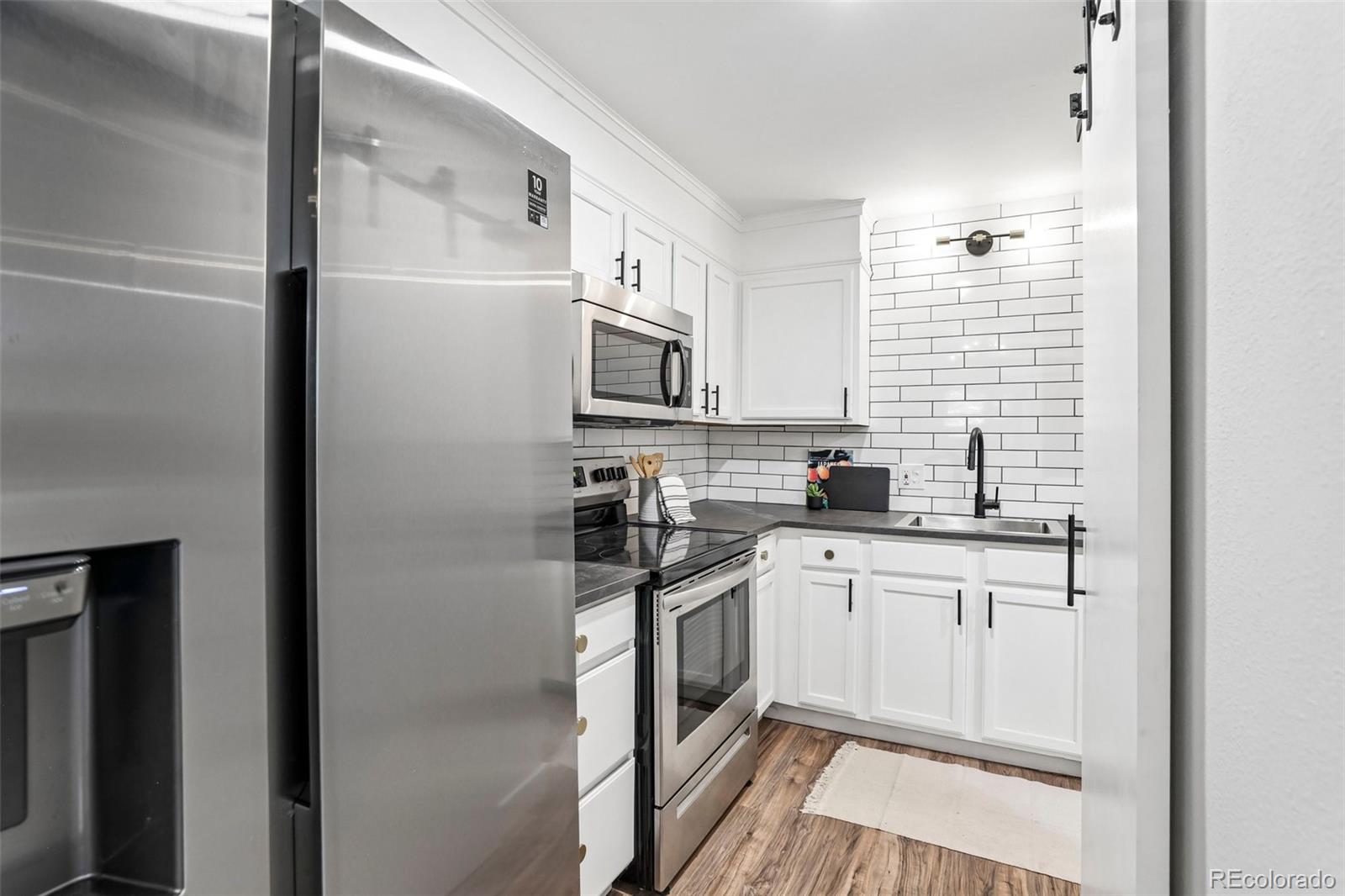 MLS Image #1 for 6455 e bates avenue,denver, Colorado