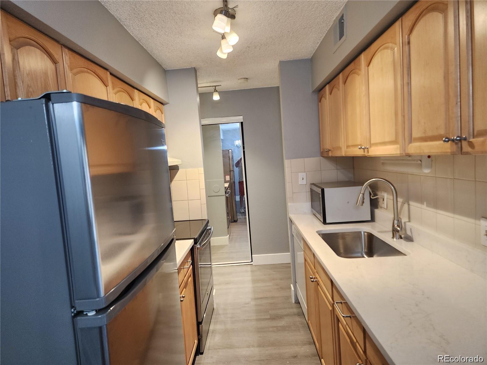 MLS Image #3 for 7695 e quincy avenue 201,denver, Colorado