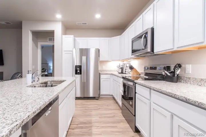 MLS Image #2 for 14351 e tennessee avenue,aurora, Colorado
