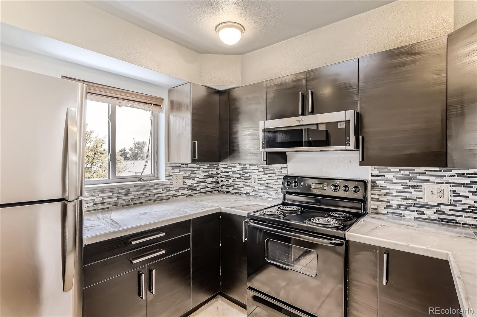 MLS Image #9 for 1226 s monaco parkway,denver, Colorado