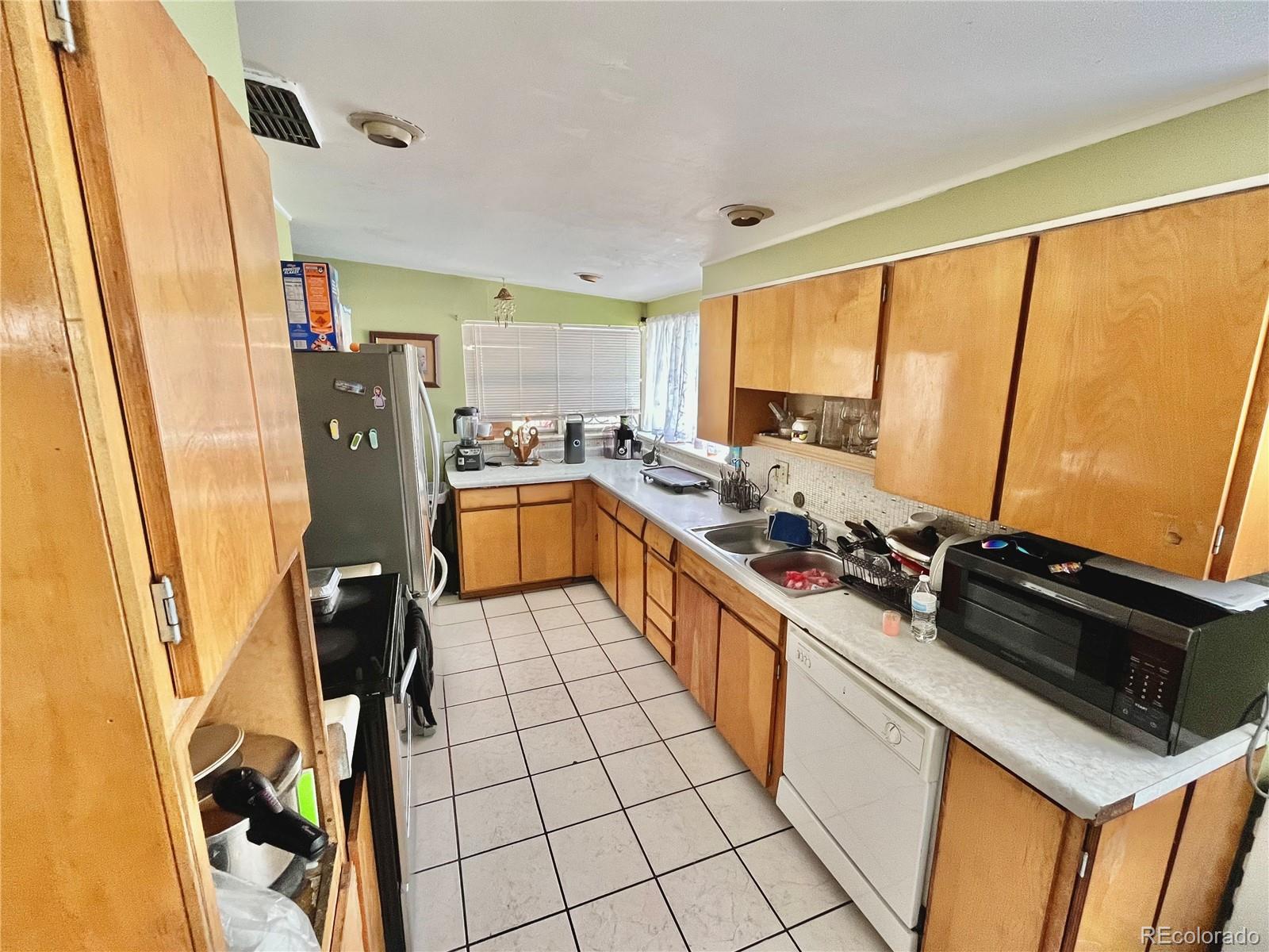 MLS Image #3 for 1309 s eliot street,denver, Colorado