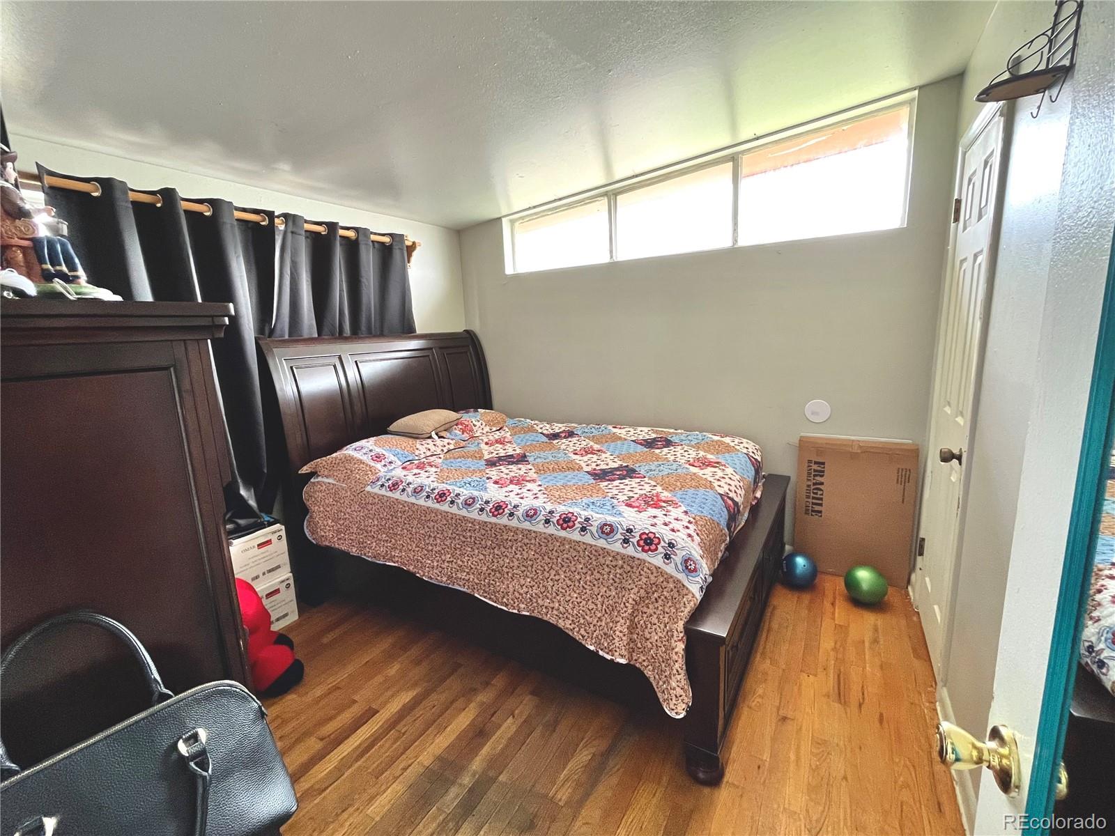 MLS Image #5 for 1309 s eliot street,denver, Colorado
