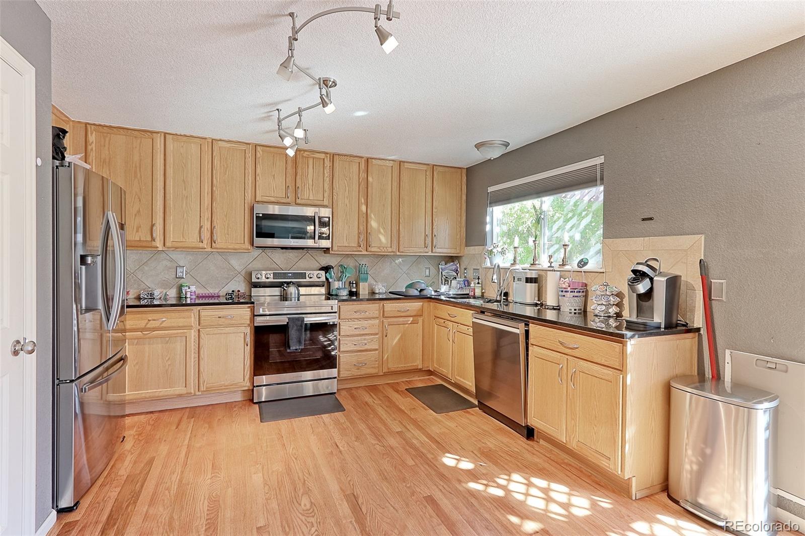 MLS Image #5 for 128 n prairie falcon parkway,brighton, Colorado