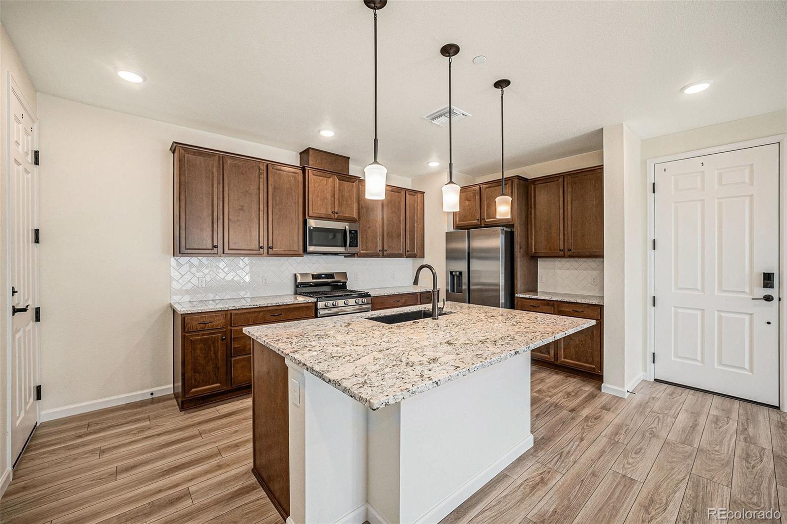 MLS Image #3 for 6153 n ceylon street,denver, Colorado