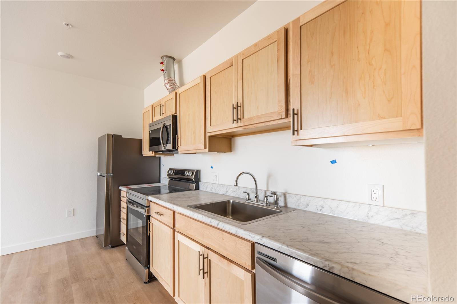 MLS Image #3 for 5702 n central park boulevard boulevard 214,denver, Colorado