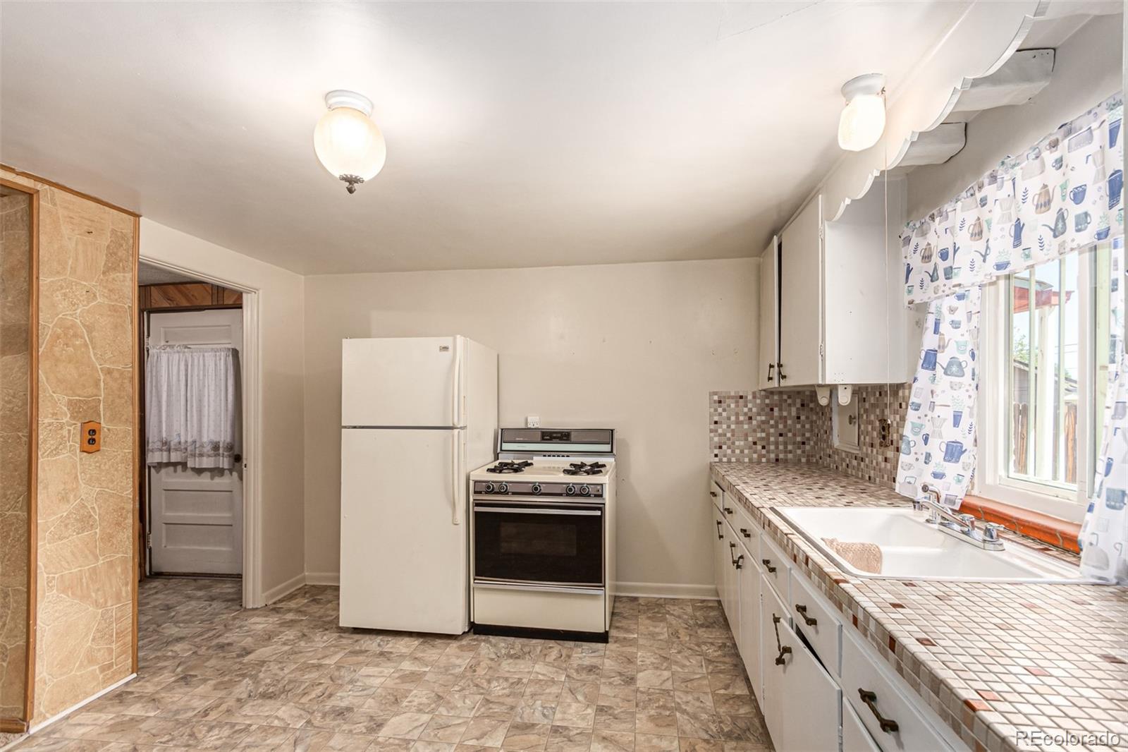 MLS Image #10 for 804 s quitman street,denver, Colorado