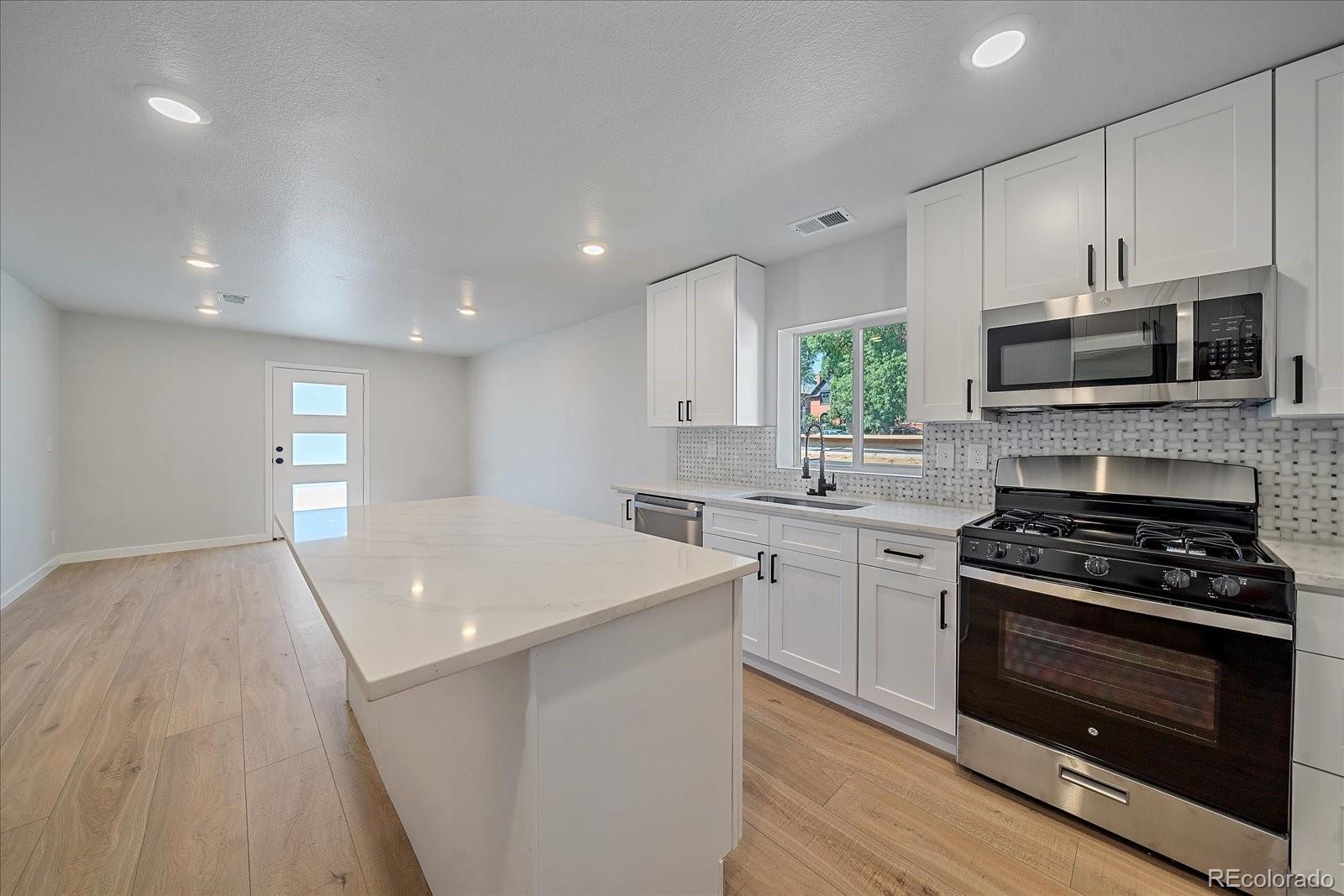 MLS Image #2 for 3738 n eliot street,denver, Colorado