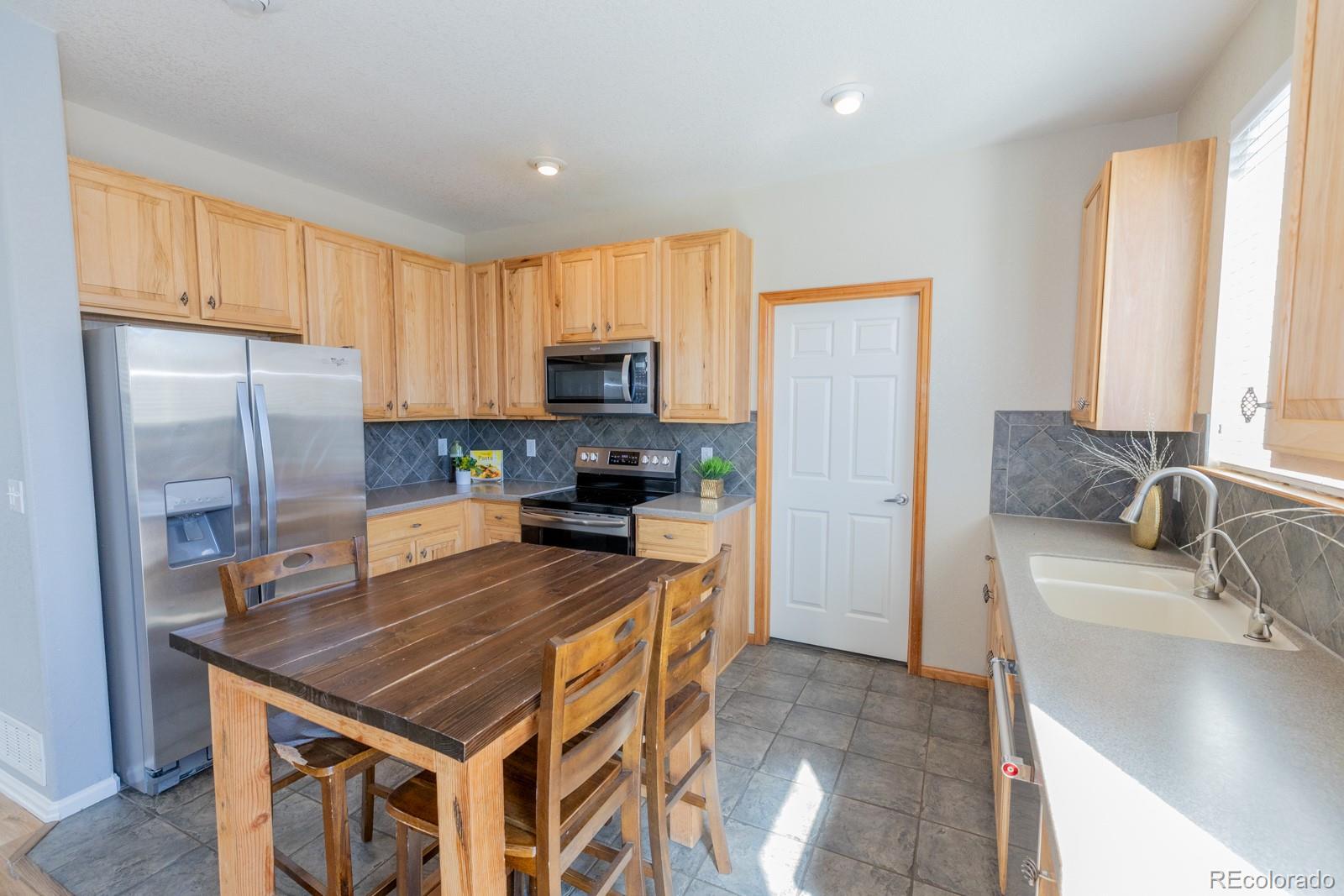 MLS Image #5 for 414  hedgerow way,brighton, Colorado