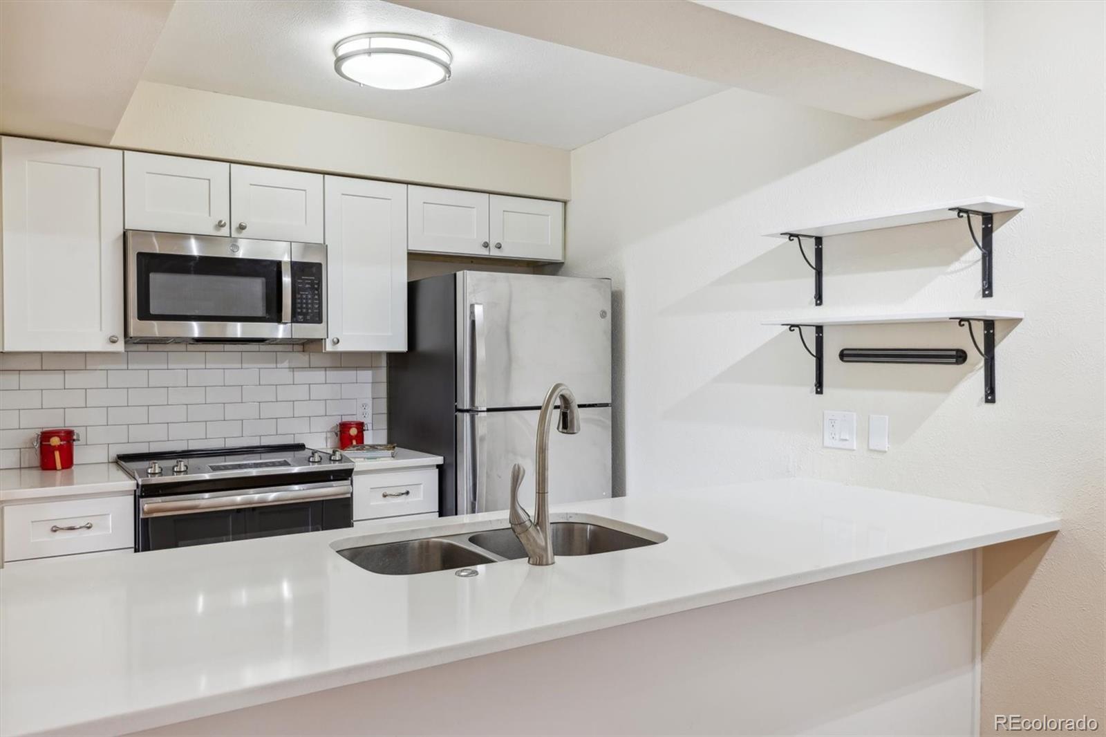 MLS Image #1 for 3121 s tamarac drive 201k,denver, Colorado
