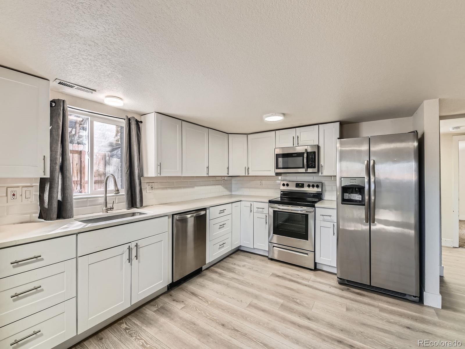 MLS Image #2 for 5665  niagara street,commerce city, Colorado