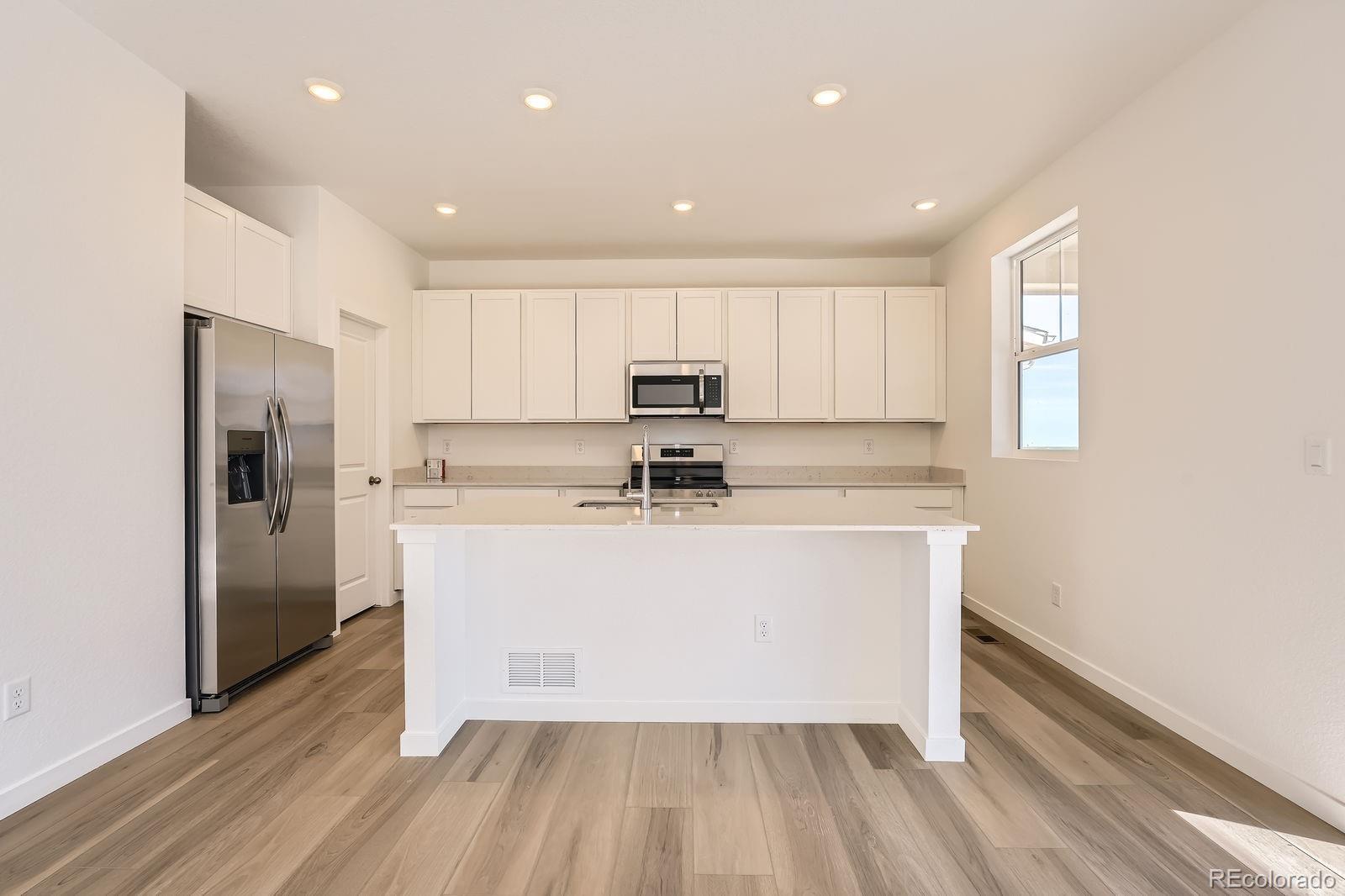 MLS Image #3 for 728 n clubview street,watkins, Colorado