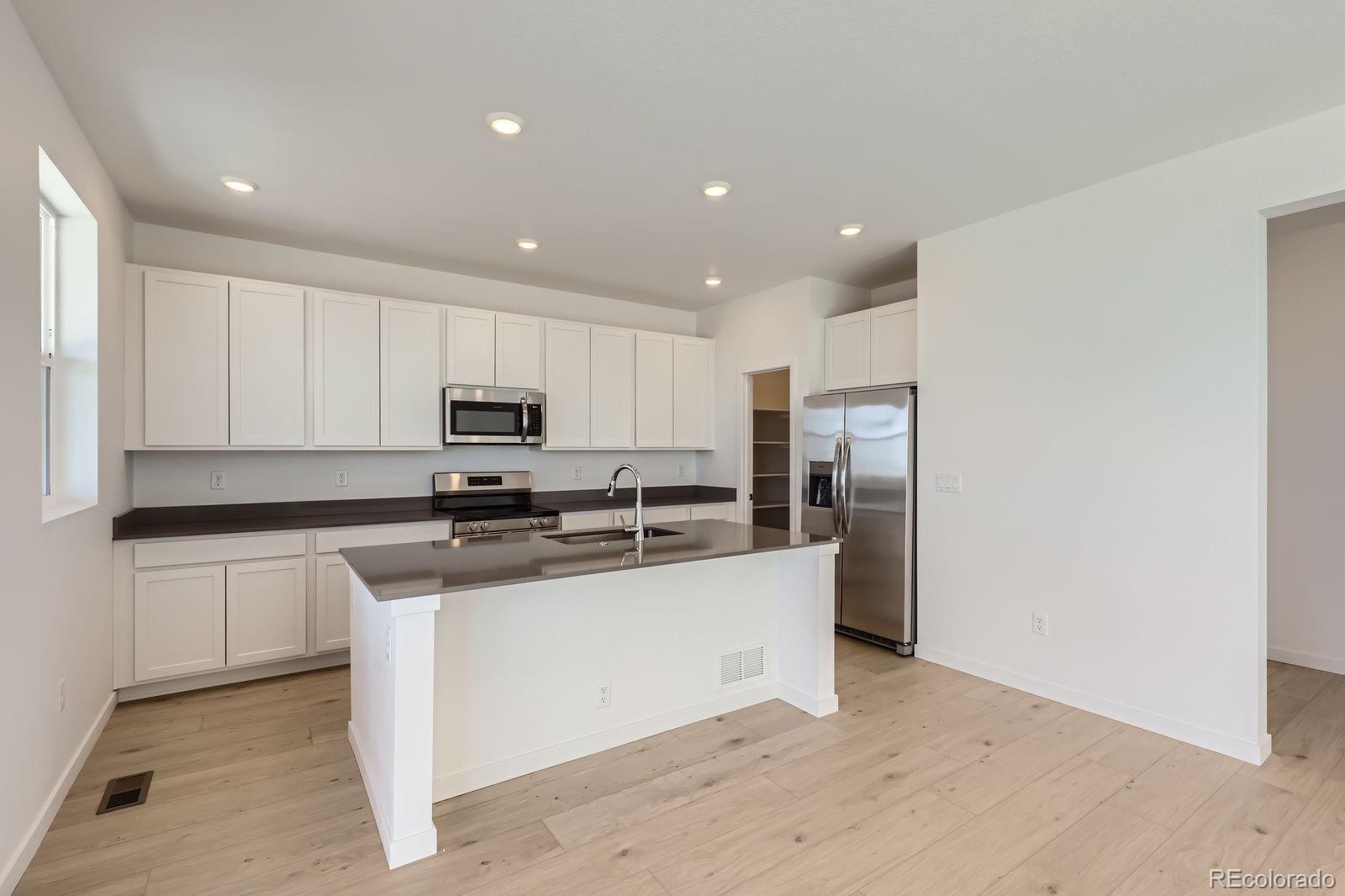 MLS Image #4 for 710 n deer park,watkins, Colorado
