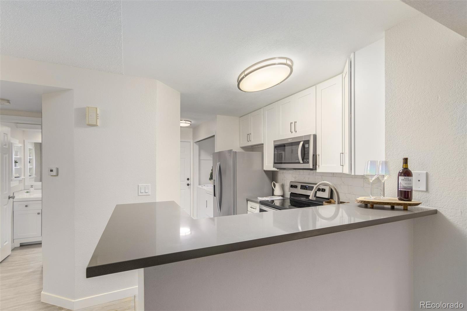 MLS Image #7 for 12585 e tennessee circle,aurora, Colorado