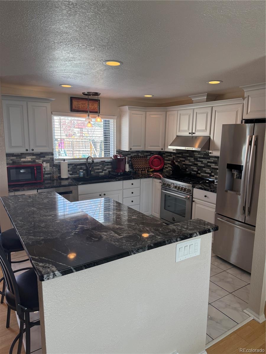 MLS Image #3 for 5042 s hoyt street,littleton, Colorado