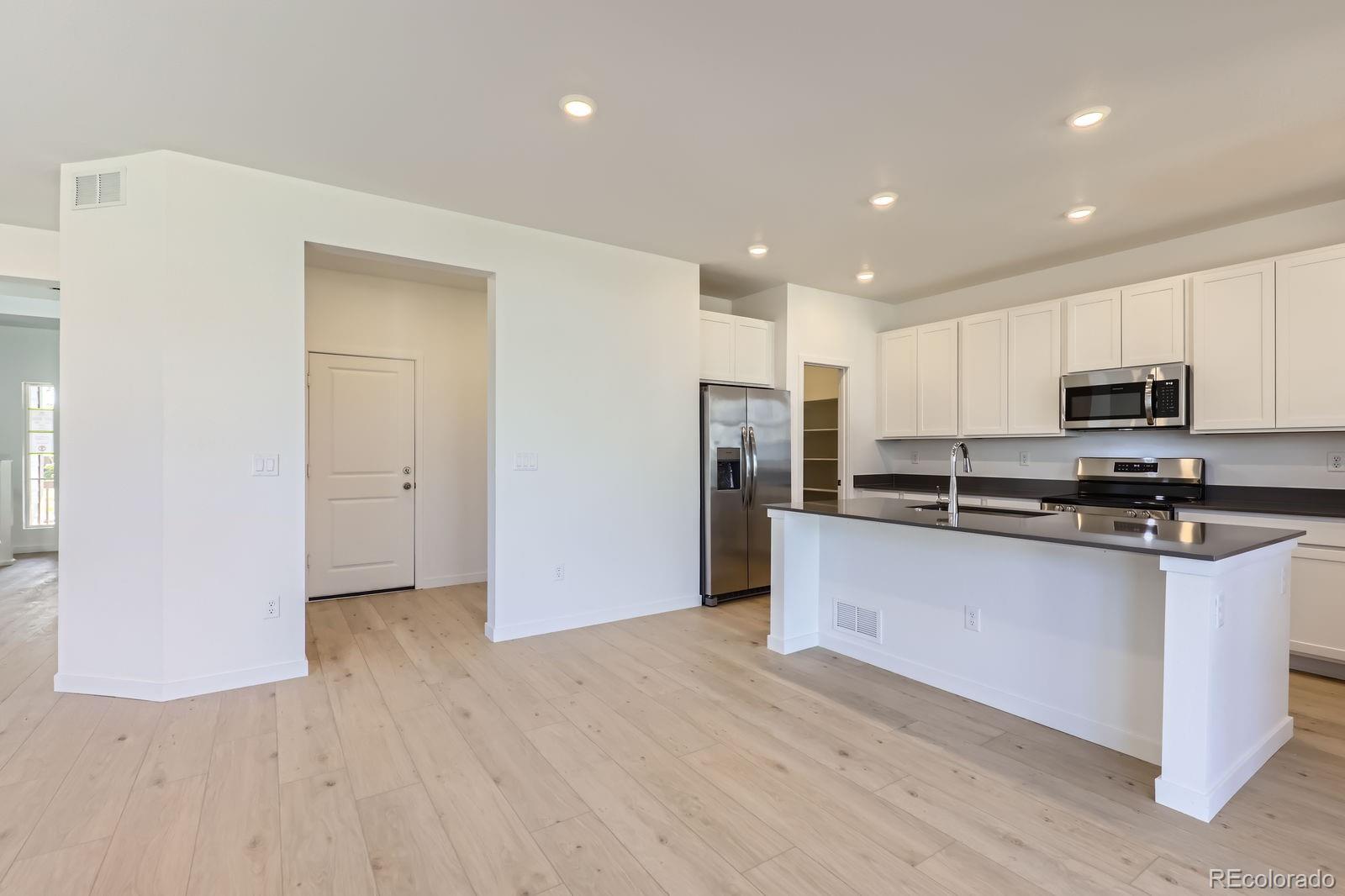 MLS Image #3 for 719 n deer park,watkins, Colorado
