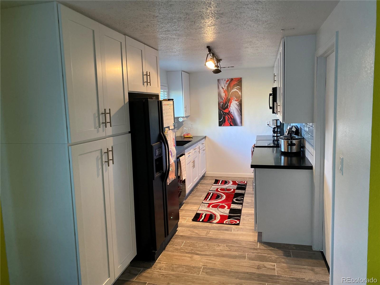 MLS Image #5 for 1596  arapahoe street,strasburg, Colorado
