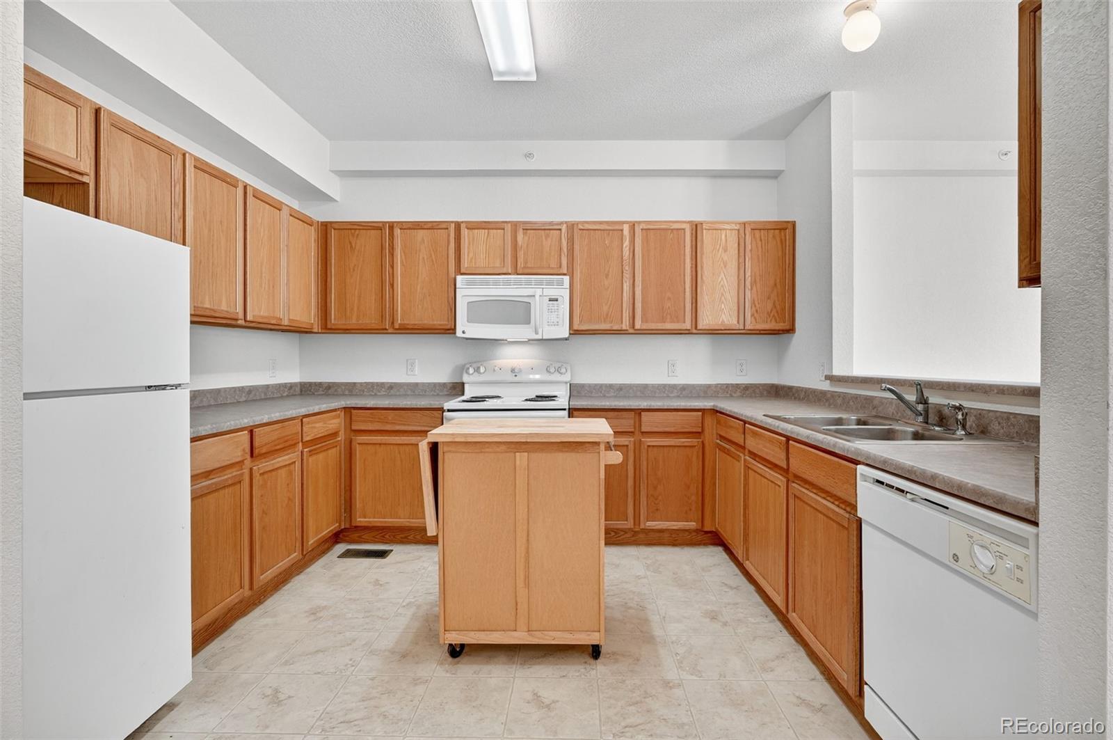 MLS Image #1 for 9758  laredo street 24e,commerce city, Colorado