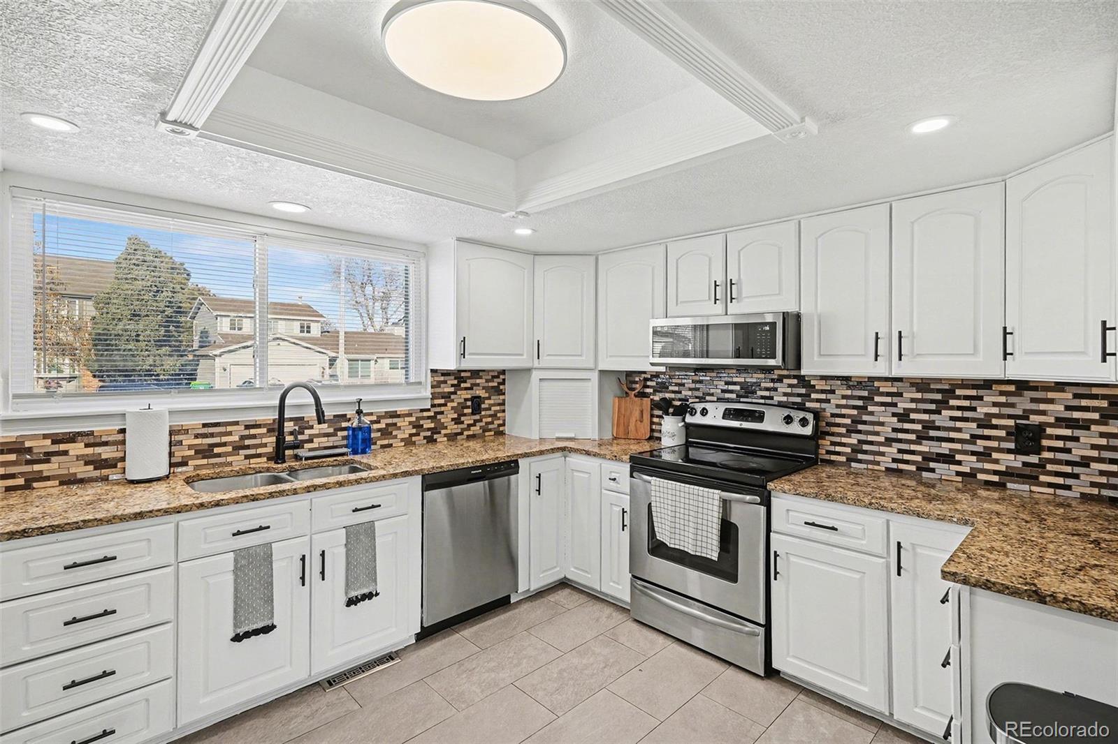 MLS Image #2 for 14894 e warren avenue,aurora, Colorado