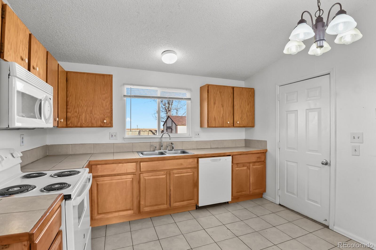 MLS Image #8 for 845  madison way,bennett, Colorado