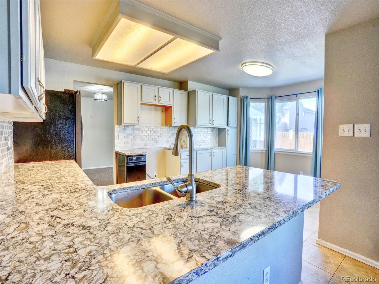 MLS Image #3 for 11727  oswego street,commerce city, Colorado